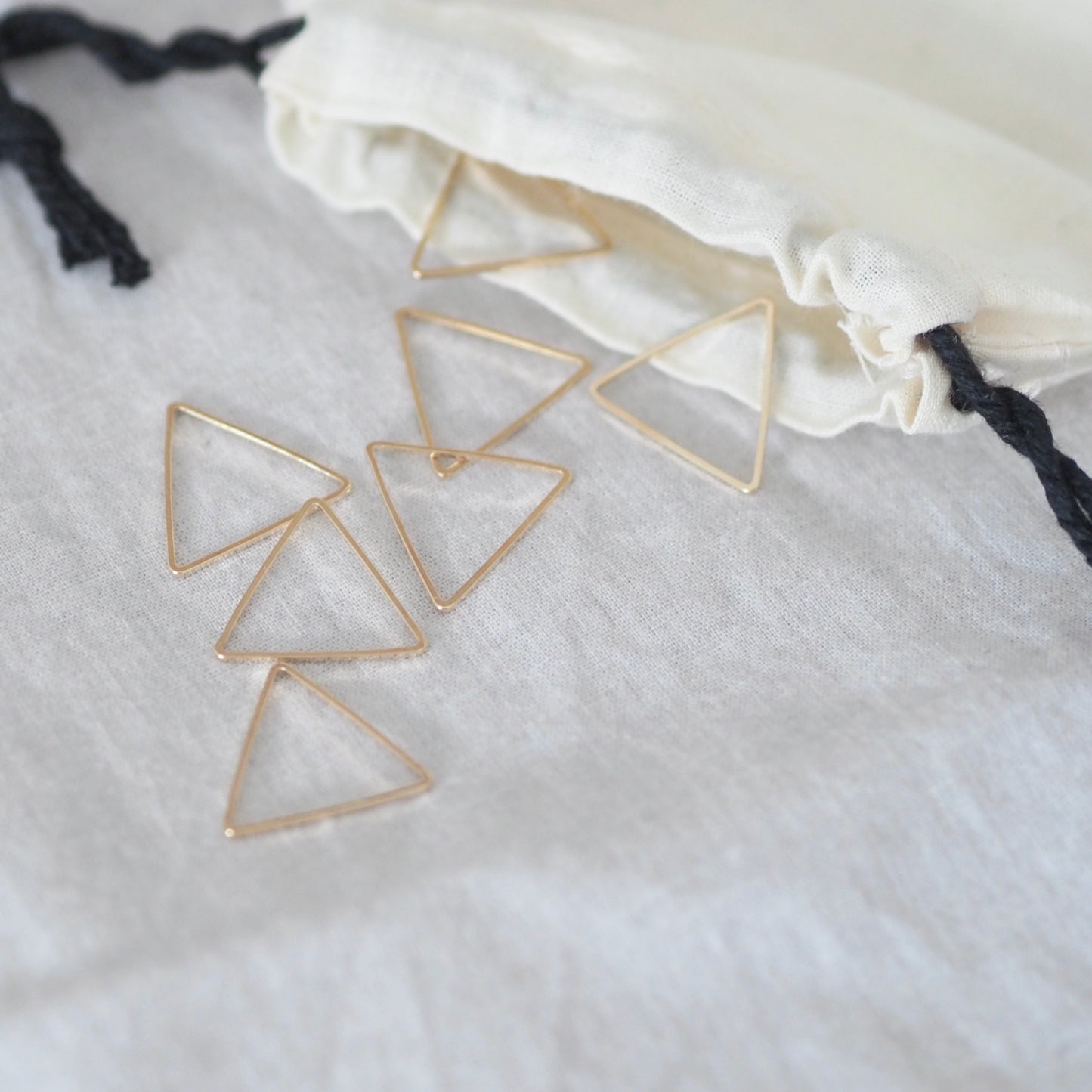 Markør triangel gull